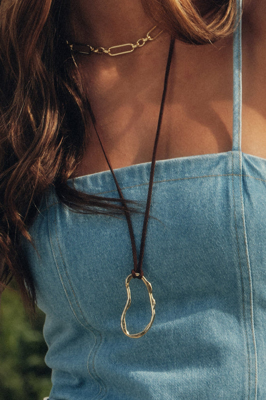 Tiburon Abstract Oval Pendant Suede Cord Necklace